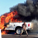 Illustration for article titled Watch This Maniac Torch His Truck And Dance Around It In Traffic